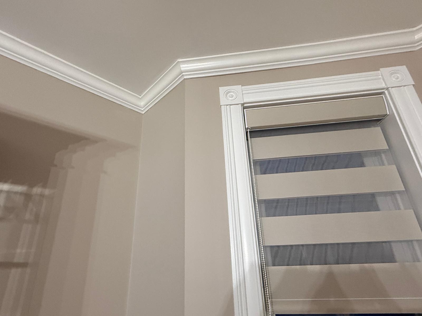Crown molding and window casing finish carpentry in a Massachusetts home